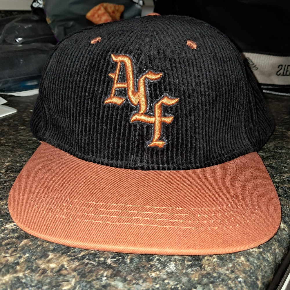 Black and Burnt Orange Corduroy Cap with Embroidered Logo
